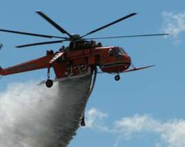 INCENDIO SAN GIACOMO: IL ROGO E’ DOLOSO, LANCI D’ACQUA DA ELICOTTERO