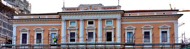 L’AQUILA: FINITI I LAVORI A PALAZZO POSTE, IL FUTURO TRA HOTEL E UFFICIO POSTALE